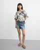 Distinctive Ripped Denim Shorts