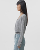 A Long-sleeved Knitted Sweater with A Twisted Design And Crossed V-neck