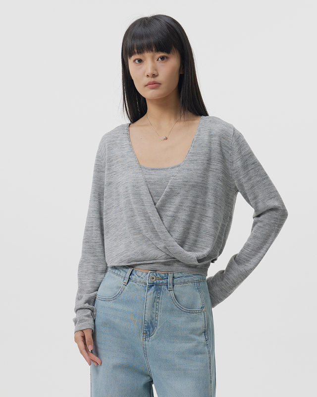 A Long-sleeved Knitted Sweater with A Twisted Design And Crossed V-neck